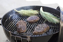 Grilling over charcoal